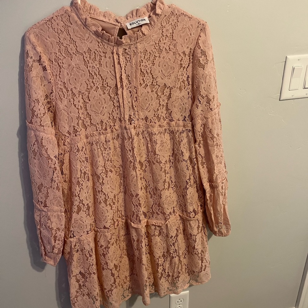 Light pink mini dress with floral detailing